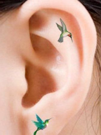 Small Hummingbird Tattoo Behind Ear, Tiny Hummingbird Tattoos, Fairy Ear Tattoo, Hummingbird Ear Tattoo, Tiny Hummingbird Tattoos For Women, Helix Tattoo, Small Ear Tattoos For Women, Dainty Ear Tattoos, Helix Tattoo Ideas