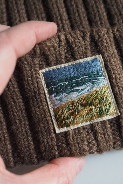 Embroidery: view from the dunes of Sylt to the North Sea. The embroidery and the label inside are sewn so that the hat can stretch on the head and the embroidery does not interfere with the tension of the yarn.
Material: new UNIQLO hat, 85% acrylic, 13% wool, 1% polyamide, 1% elastane
Color: soft brown. Please note that the displayed colors may vary depending on the device and screen. Adjustable Embroidered Cotton Hat, Embroidered Toque, One Size Embroidered Beanie Hats, Embroided Beanie, Hand Embroidered Patches, Embroidered Cotton Beanie, One Size Fits Most, Embroidered Beanie, Embroidered Hat, Embroidery On Clothes