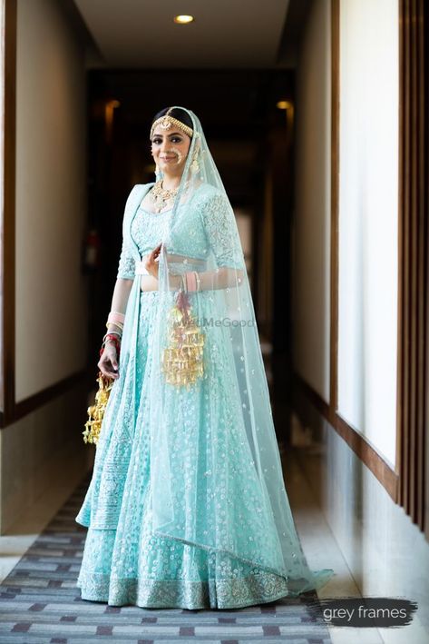 Aqua blue bridal lehenga for wedding. See more on wedmegood.com  #wedmegood #indianwedding #indianbride #bridallehenga #lehenga #lehengacholi #kaleere #weddingdress Indian Bridal Lehenga Blue, Light Blue Lehenga, Blue Bridal Lehenga, Bollywood Brides, Lehenga Blue, Half Sarees, Indian Bridal Lehenga, Bridal Lehenga Red, Blue Lehenga