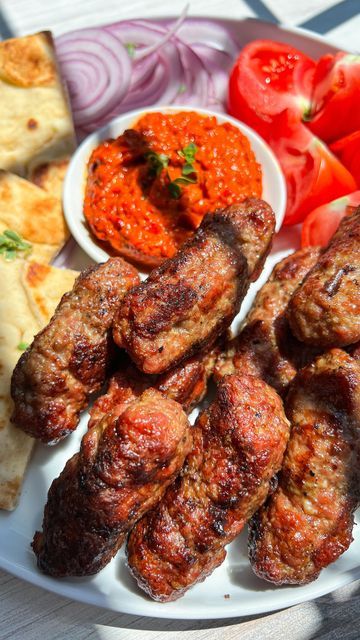 Snejana Andreeva on Instagram: "Comment ✨RECIPE✨ and I’ll send the recipe to your DMs — (Instagram ONLY) If you’re watching on Facebook, read below ⬇️ for the link 🔗  
⠀⠀⠀⠀⠀⠀⠀⠀⠀⠀⠀  
It’s no secret that in the Balkans, we loooove our meat! Cevapi, or Ćevapi (if you want to be legit 😉), is a staple Balkan dish that’s not only a popular street food but also a must-have at every Balkan gathering or barbecue. In Bulgaria, we refer to these small meat sausages as Kebapcheta (same ingredients, but slightly longer to resemble a kebap), and I have been enjoying these ridiculously tasty little meat sausages since I was a mini Sneji. 
⠀⠀⠀⠀⠀⠀⠀⠀⠀⠀⠀
Extra Notes 🗒️ 
1. The egg is OPTIONAL so if you’re egg-free, leave it out. Depending on the quality or type of meat you use, I like to add an egg or egg Food Aethstetic, Balkan Food, The Balkans, An Egg, The Egg, Egg Free, The Recipe, Street Food, Bulgaria