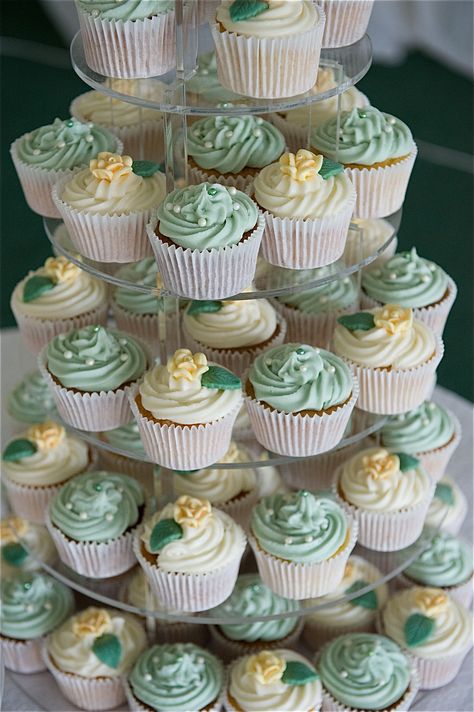 cup cake tower Sage Green Cupcakes Aesthetic, Sage Green And White Party Decor, Sage Green Quinceanera Decorations, Green Cupcakes Decoration, Green Cupcakes Birthday, White And Green Cupcakes, Sage Green Quinceanera Theme Decor, Birthday Green Theme, Green And White Cupcakes