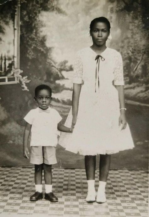 Rare photograph of Reggae superstar DENNIS BROWN and his aunt PENNY, taken at Morais Studio of Photography on Orange Street, Kingston, 1961... Dennis Brown Reggae, Dennis Brown, Peter Tosh, Reggae Artists, Jamaican Music, Reggae Music, Kingston, Jamaica, Penny