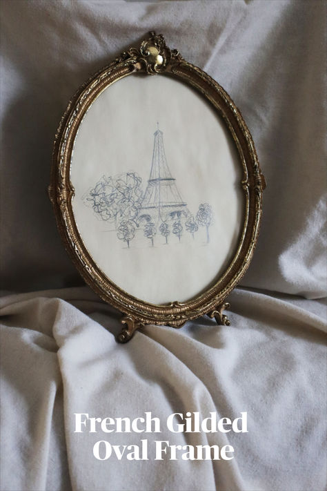 gilded oval frame with eiffel tower sketch Romantic French Bedroom, Gilded Frame, French Bedroom, Oversized Art, Oval Frame, Round Up, Photography Branding, French Style, Antique Style