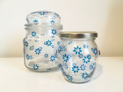 Hand painted upcycled glass jars - Daisy Delight, in blue. Limited Edition. Christmas gift. Birthday gift. Gift for home. Novelty gift. by SazPomArt on Etsy Glass Jar Painting, Upcycled Candle Jars, Decorate Glass Jars, Candle Upcycle, Coin Jar, Painting Glass Jars, Jar Design, Glass Paint, Painted Jars