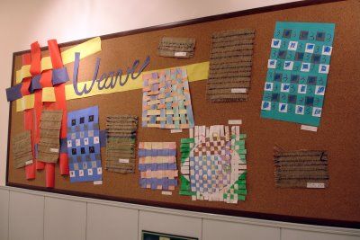 Weaving bulletin board Textiles Classroom Displays, Burlap Weaving, Weaving Display, Third Grade Art, Paper Weave, Art Bulletin Boards, Steam Art, 5th Grade Art, Arts Integration