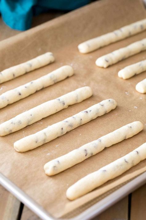 These cute cookie sticks are a fun twist on cookies! Make them for the holidays by dipping in chocolate and covering with festive sprinkles! Cookies For Dipping, Butter Cookie Sticks, Cookie Swap Cookie Ideas, Rolled Chocolate Chip Cookies, Desserts On Sticks, Cookie Sticks Decorated Christmas, Chocolate Chip Cookie Sticks, Easy Holiday Treats For Kids, Orange Shortbread Cookie Sticks