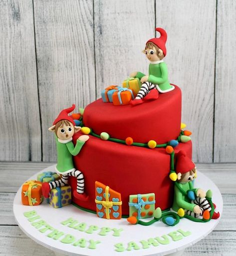 Two tier topsy turvy birthday cake for a little boy celebrating his birthday at Christmas. featuring some cheeky little Christmas elves sneaking the presents. Christmas Birthday Cake, Black Frosting, Christmas Themed Cake, Christmas Cake Designs, Christmas Cake Decorations, Xmas Cake, Winter Cake, Christmas Elves, Topsy Turvy