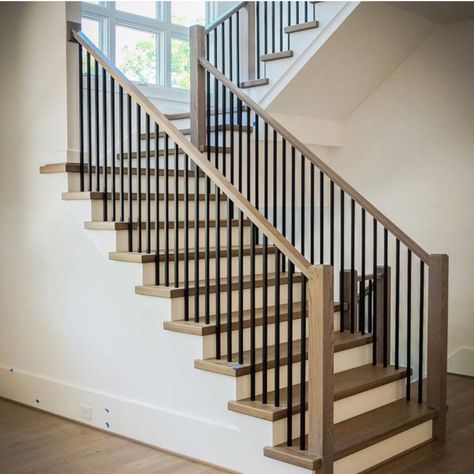 Elevate Your Space with S01 Wrought Iron Balusters - Set of 30 decorative metal balusters designed to add a touch of elegance to your decks and spiral stair railing. Crafted with precision, these 1/2-inch hollow plain bar balusters come in a striking satin black finish, making them a timeless addition to any space. Upgrade your railing with these stylish iron spindles and transform your surroundings. https://amzn.to/3qaSLLU Decking Balustrade, Staircase Spindles, Wood Railings For Stairs, Metal Stair Railing, Metal Balusters, Stairs Renovation, Modern Stair Railing, Stair Spindles, Staircase Railing Design