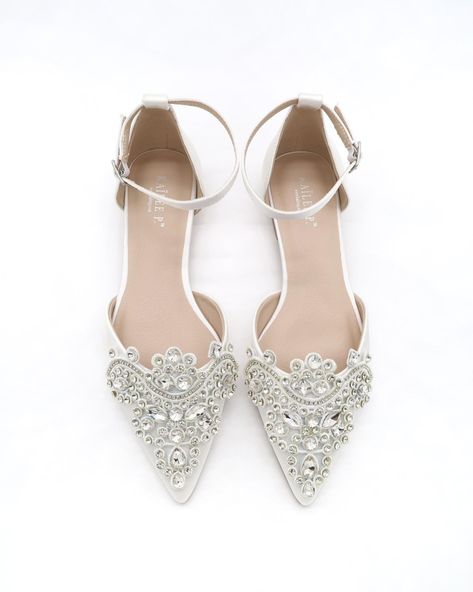 Classic chic satin pointy toe flats topped with sparkly embellished oversized appliqué. Comfort with simplicity perfect for any special events. Pair with a matching clutch to complement your look: https://www.etsy.com/listing/1302254706/ Details: Colors available: Black, Champagne, Dusty Pink, Hunter Green, Ivory, Light Blue, Silver, and White UPPER: Synthetic upper and lining MATERIALS: Manmade outsole HEEL HEIGHT: 0.3" STYLE NAME: BELLA Not sure of which size to purchase? Shoes measurements are as follow: (Please note measurements taken the length of inside of shoe from toe to heel) Size 5.5 - 9.25" Size 6 - 9.50" Size 6.5 - 9.75" Size 7 - 10" Size 7.5 - 10.15" Size 8 - 10.25" Size 8.5 - 10.50" Size 9 - 10.75" Size 10 - 11" Size 11 - 11.25" - We DO NOT offer refunds.  Selected items are Women Wedding Shoes, Satin Wedding Shoes, White Bride, Pointy Toe Flats, Rhinestone Appliques, Womens Wedding Shoes, Bride Shoes, Pointed Toe Flats, Satin Wedding