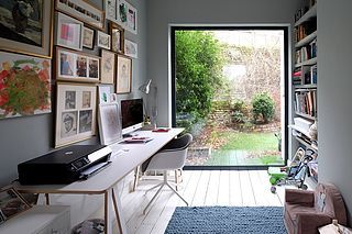 A Fashion Buyer-Turned-Blogger's Charming London Home — House Tour | Apartment Therapy Main | Bloglovin’ Home Office Extension, Office Large Window, Home Office With Big Windows, Home Office Garden Room, Home Office Big Windows, Office With Big Windows, Office Big Window, Garden Room Office, Garage Into Office Space