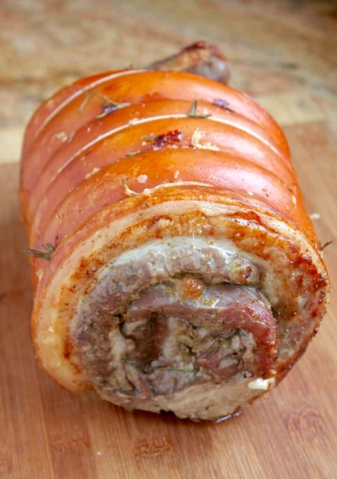 uncut porchetta on a board Rolled Pork Roast, Porchetta Roast, Porchetta Recipe, Porchetta Recipes, Pork Roast Recipe, Italian Christmas Recipes, Pork Roll, Pork Roast Recipes, Inexpensive Meals