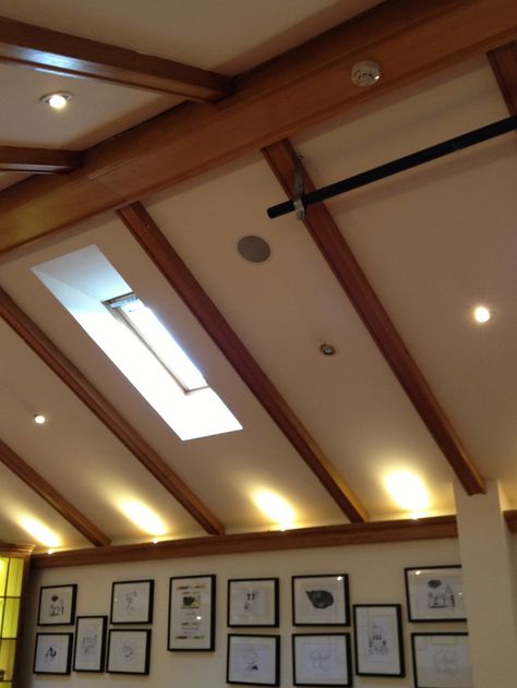 Slope Roof Ceiling Design, Sloping Roof Ceiling Design, Sloping Roof Lighting, Sloped Roof Lighting, Slope Roof Interior Lighting, Lighting For Sloped Ceiling, Racked Ceiling, Skylight Wood Ceiling, Sloping Roof Bedroom