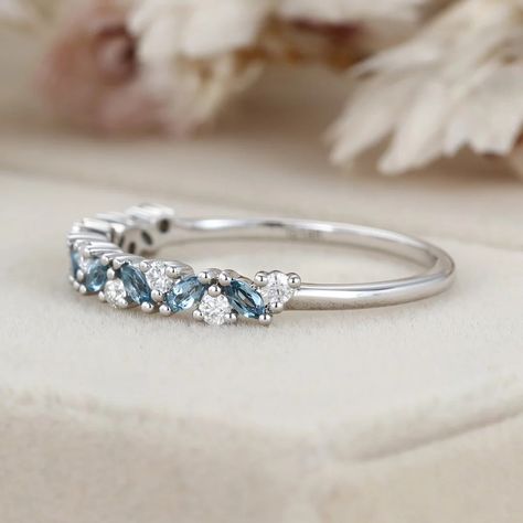 Elevate your wedding ensemble with our 14k White Gold London Blue Topaz and Moissanite Half Eternity Wedding Band. A blend of sophistication and allure. Minimalistic Engagement Ring Silver, Blue Topaz Wedding Band, Aquamarine Wedding Band, Fun Rings, Sapphire Eternity Ring, Unique Wedding Band, Eternity Ring Gold, Writing Motivation, Minimalist Engagement Ring