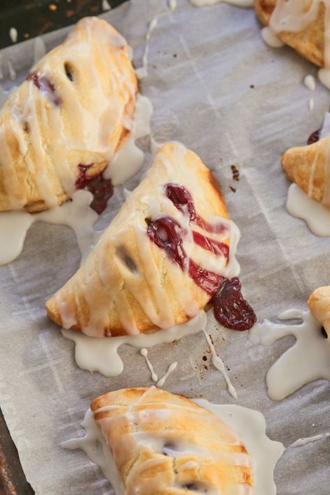 Cherry Hand Pies, just baked. Cherry Hand Pies Recipes, Fruit Hand Pies, Gemma Stafford, Cherry Hand Pies, Hand Pie Recipes, Bigger Bolder Baking, Fried Pies, Baking Cookbooks, Hand Pie