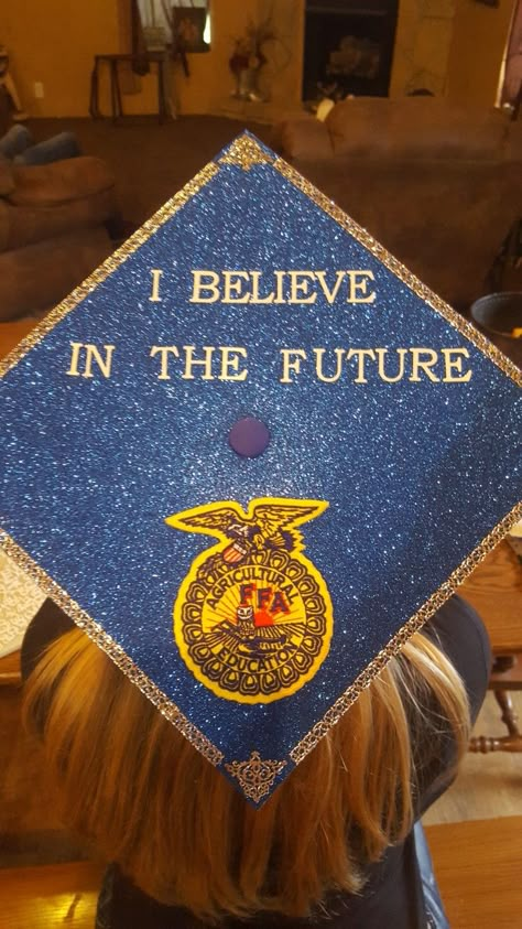 Senior cap with FFA emblem for graduation Ffa Graduation Cap Ideas, Ffa Convention Packing List, Ffa Room Decor, Ffa Tattoo Ideas, Ffa Senior Gifts, Ag Graduation Cap, Ffa Graduation Party Ideas, Ffa Advisor Gifts Ideas, Ffa Wallpaper