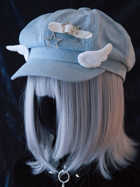 Elevate your kawaii style with this charming handmade denim hat featuring a delightful star buckle and wings design. The light blue denim adds a touch of casual elegance, while the pins decoration adds a playful and customizable element. This hat is perfect for adding a whimsical touch to any outfit, and is sure to turn heads wherever you go.  Please note that this product includes only the hat. Pastel Blue Accessories, Oc Accessories Ideas, Star Themed Outfits, Hat Design Ideas, Hat Reference, Aesthetic Hats, Aesthetic Hat, Star Accessories, Star Outfit