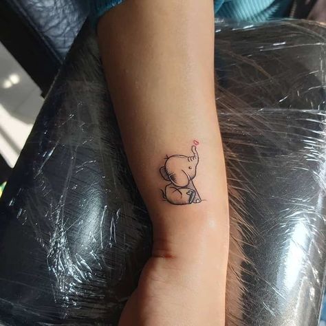 Elephant Wrist Tattoos For Women, Elephant Wrist Tattoo, Impressive Tattoos, Little Elephant Tattoos, Small Elephant Tattoo, Tattoos Elephant, Arm Women, Elephant Tattoo Meaning, Cute Elephant Tattoo