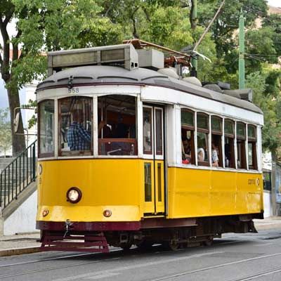 Luxury Travel Accessories, Lisbon Tram, Lisbon Travel Guide, Day Trips From Lisbon, Lisbon Travel, Best Travel Accessories, Visit Portugal, Vacation Days, Tourist Trap