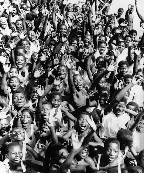 Ghanaian school children welcome Queen Elisabeth II and Prince Philip, Duke of Edinburgh, upon their arrival in Accra on November 9, 1961 in Accra, Ghana. (Photo by Keystone-France \ Gamma-Rapho via Getty Images) Africa Photography, Elisabeth Ii, Black And White Aesthetic, Prince Philip, Event Poster, Music Event, Iconic Photos, Black People, White Aesthetic