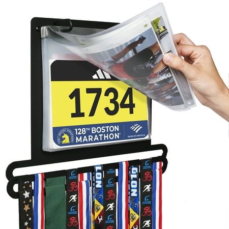 DISPLAYS YOUR ACHIEVEMENTS  Showcase your accomplishments and organize your accolades with our modern, space-saving medal & bib display rack! This one-of-a-kind award display also includes plastic sleeves for protecting and showcasing your race bibs.  10 PLASTIC SLEEVES  This rack can hang dozens of lanyard-style medals and is designed especially for lanyard ribbon medals. The rack includes hooks for holding up to 40+ lanyard-style medals. This product is tailored specifically for bibs given out