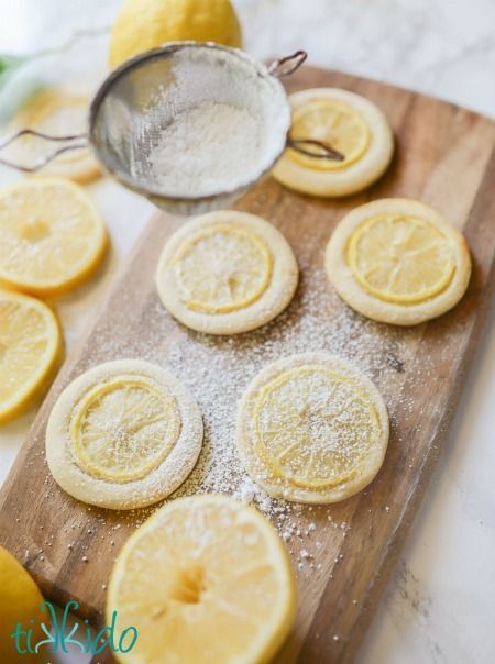 If you love lemon like I do, you've probably been dissapointed with lemon desserts before.  You know the ones, that look great, but don't actually taste like lemons, just kind of smell like them.  These lemon slice cookies are the opposite of those disappointments.  These will blow you away with their lemon awesomeness. Lemon Topping, Slice Cookies, Lemon Sugar Cookies, I Am Baker, Lemon Slices, Lemon Flavor, Lemon Cookies, Lemon Desserts, Lemon Slice