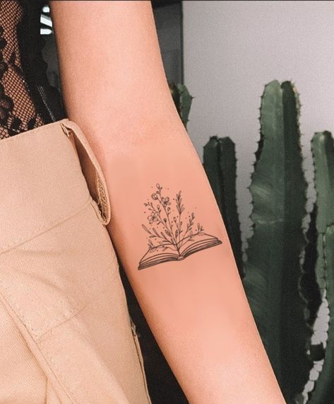 Tiny Book Lover Tattoo, Book With Flowers Coming Out Tattoo, Blooming Book Tattoo, Sticker Book Tattoos, Book And Wildflower Tattoo, Female Floral Tattoos, Elbow Book Tattoo, Book Sister Tattoo, Plant Book Tattoo