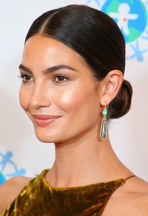 The Secrets to Lily Aldridge's Goddess Hair | ASOS Lily Aldridge Hair, Glitzy Earrings, Neat Bun, Low Bun Wedding Hair, Makeup Tip, Low Bun Hairstyles, Goddess Hairstyles, Peinados Fáciles Para Cabello Corto, Lily Aldridge