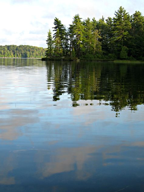 Love the clouds reflected in the water.  Photo is taken in the Haliburton HIghlands, Ontario Algonquin Park, Mystical Places, Nature Travel, Travel Aesthetic, Natural Landmarks, Water, Travel