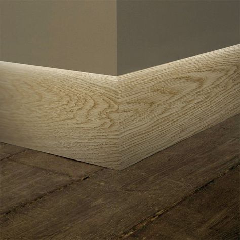 "This Unfinished White Oak Baseboard Moulding is the perfect finishing touch for any project. Made from solid hardwood, this moulding is durable and built to last. The 9/16 inch thickness and 5 1/4 inch width make it the ideal size for adding a decorative touch to any space. At 7 feet in length, this moulding is designed to fit seamlessly within your space. Its unfinished surface allows you to customize the look to match your specific decor needs, whether you want a natural wood finish or to pai White Baseboards, Baseboard Moulding, Interior Door Trim, Wall Trim, Natural Wood Finish, Baseboards, Floor Decor, Remodeling Projects, Solid Hardwood