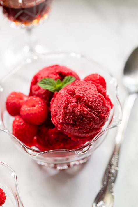 The most luxurious raspberry sorbet infused with decadent Chambord raspberry liqueur. It's easy to make with just 4 ingredients, without an ice cream maker, and no churning required. It's a must-try indulgent, refreshing adult dessert that's dairy-free, gluten-free, and egg-free! Blueberry Sorbet, Sorbet Ice Cream, Raspberry Ice Cream, Raspberry Liqueur, Fruit Ice Cream, Lemon Sorbet, Raspberry Sorbet, Refreshing Desserts, Ice Cream Maker