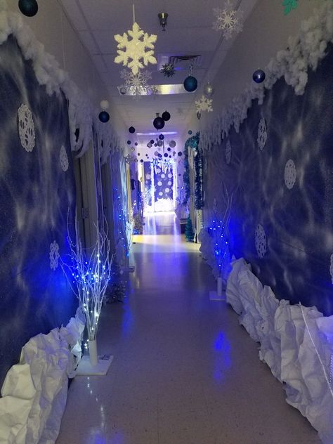 Snowflake Hallway Decorations, Frozen Themed Classroom Door, Winter Theme Hallway, Winter Wonderland Hall Decorations, Easy Christmas Hallway Decorations, Winter Wonderland At School, Winter Rally Themes, Elementary School Winter Dance, Christmas Themed School Hallways