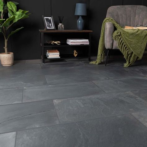 These Mahal Black Brushed Slate Tiles have a beautiful brushed finish and are made from natural slate. These slate tiles are extremely impenetrable enabling the slate to be lightly honed to give a brushed finish, which results in the slate tiles keeping a very subtle riven finish on the surface. Tile thickness may vary due to the natural undulation created when brushed.   What's special about these tiles? > Slate stone effect design > 8-12mm thick natural slate body > Perfect for a stylish naturalistic patio space > R11 anti-slip surface > Long lasting and frostproof   Sealing and maintenance Due to the porosity of natural stone, they do require sealing. They need to be given a few coats before grouting and a further coat after to ensure they are well-protected. To keep the tiles their nat Black Slate Floor, Grey Slate Tile, Black Slate Tiles, Herringbone Laminate Flooring, Slate Tiles, Slate Tile Floor, Country Vibe, Black Floor Tiles, Grey Floor Tiles