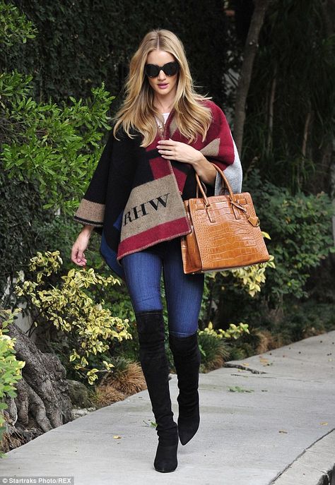 That's quite a look: The 27-year-old teamed the item with a sexy pair of black suede over-the-knee boots Boots Outfit Classy, Suede Boots Outfit, Burberry Poncho, Burberry Cape, Outfit Classy, Huntington Whiteley, Poncho Style, Rosie Huntington Whiteley, Olivia Palermo