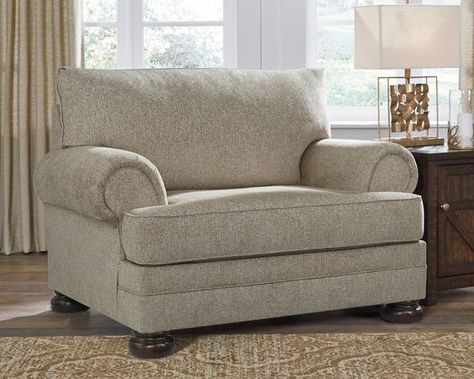 This sumptuously styled oversized chair proves that a richly traditional look doesn’t have to break the bank. Flared effect gives the classic roll arms a relaxed feel, while the choice of a plush chenille upholstery in oatmeal is earthy elegance at its best. Distinctively turned bun feet in a dark finish add to the chair’s substantial presence. Signature Design by Ashley® is a Registered Trademark of Ashley Furniture Industries, LLC. Oversized Chair Living Room Overstock, Oversized Chair With Ottoman For Small Space, Oversized Reading Chair Overstock, Comfy Accent Chairs Kohl's, Oversized Reading Chair Uk, Ashley Bank, Earthy Elegance, Oversized Chair And Ottoman, Oversized Chair