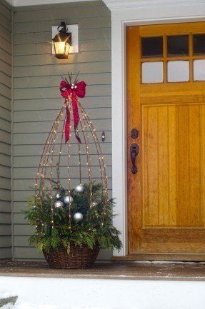 Willow Obelisk Planter - Garden Obelisk | Gardener's Supply Obelisk Planter, Christmas Urns, Outdoor Christmas Planters, Outside Christmas Decorations, Garden Obelisk, Christmas Pots, Christmas Planters, Christmas Decorations Diy Outdoor, Christmas Garden