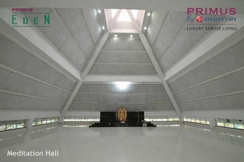 The unique pyramid shaped meditation hall is a place of utter serenity. Surrounded by trees, landscaped garden and water body, it encourages you to get in touch with your true self. Know more: http://bit.ly/PrimusEden Call us: 1800-121-0000 Meditation Hall Architecture, Meditation Hall, Pyramid Meditation, Hall Architecture, Pyramid Building, Landscaped Garden, Pyramid Shape, Water Body, Parametric Architecture