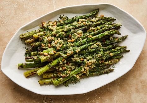 Grilled Asparagus With Miso and Olives Recipe - NYT Cooking Miso Asparagus, Cast Iron Asparagus, Grilling Asparagus, Miso Honey Chicken And Asparagus, Marinated Asparagus, Asparagus Medley, Asparagus Seasoning, Shrimp And Vegetables, Miso Dressing