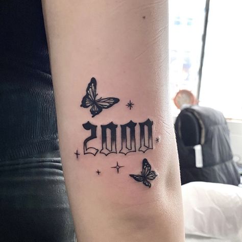 Birth Year Tattoo With Butterfly, Butterfly With Year Tattoos, 2005 Butterfly Tattoo, Birth Year Tattoo Ideas Ankle With Butterfly, Year Tattoo Number With Butterfly, Butterfly And Year Tattoo, 2000 Knee Tattoo, 1998 Tattoo Above Knee, 2000 Tattoo Ideas Women