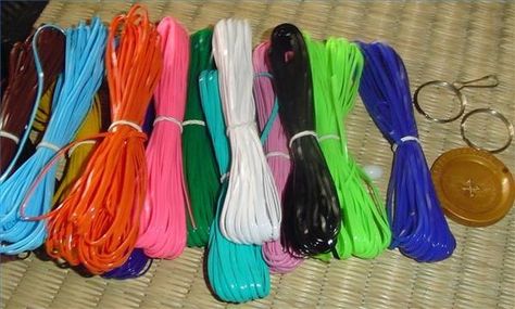 Plastic lacing for craft projects has different names, such as Rexlace, gimp and even boondoggle, depending on the manufacturer. No matter what you call it, it is a great craft material for making keychains and bracelets. Plastic Lace Crafts, Slumber Party Activities, Gimp Bracelets, Bracelets Kandi, Diy Lanyard, Plastic Lace, Pokemon Bead, Beaded Lampshade, Odd Things