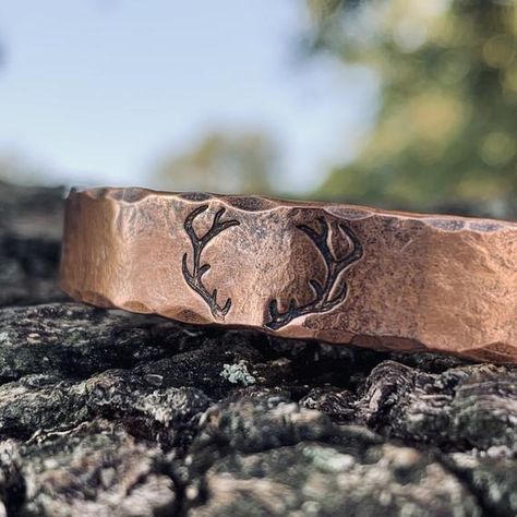 A handmade solid copper cuff bracelet for the hunter you love! This bracelet was created in fire for a rustic finish. The classic cuff that no man should be without. This bracelet is as unique as he is, no two will ever be alike. This cuff is 3/8 inch wide. Your bracelet can have an inscription done Mens Copper Bracelet, Copper Cuff Bracelet, Black Sharpie, Copper Cuff, The Hunter, Deer Antler, Deer Antlers, Copper Bracelet, Zipped Bag