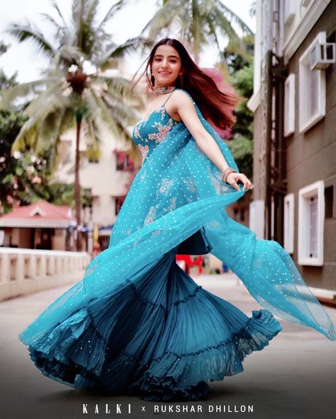 #CelebSpotted💖
Giving us major festive vibes, we spotted @rukshardhillon12 in a stunning Flowy Teal Sharara from newest Kesa Collection(Keep your eyes glued to our Instagram because its gonna be released pretty soon 💃🏻💃🏻💃🏻). Oozing undeniable charm and elegance in this flowy number she wore this for Ganesh Chaturthi and looks like a million bucks. All we can say is we love the #BlueVibes for sure. Rukshar Dhillon, Garara Dress, Indian Wedding Gowns, Sharara Suit, Traditional Indian Outfits, Indian Gowns, Indian Wedding Outfits, Ganesh Chaturthi, Indian Designer Outfits