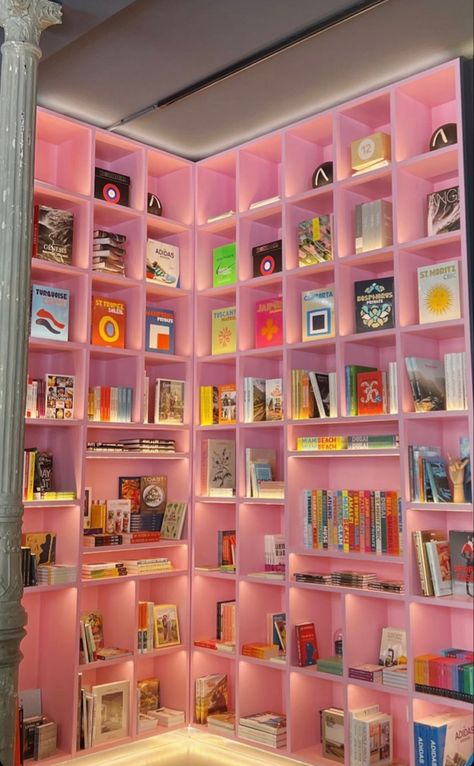 pink book shelf wall decor cubby cute Pink Maximalism Bedroom, Pink Shelves Bookshelves, Girly Modern Living Room, Girly Home Library, Girly Library Room, Barbie Office Decor, Pink Aesthetic Office, Kaws Living Room Decor, Funky Library