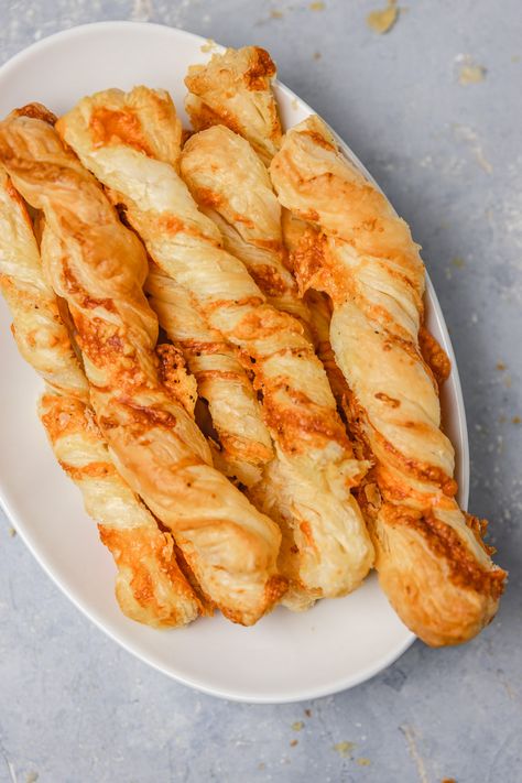 Puff Pastry Cheese Straws (Cheese Twists) - cravingsmallbites.com Puff Pastry Cheese Rolls, Puff Pastry Straws, Cheese Pastry Twists, Garlic Cheese Puff Pastry, Puff Pastry Twists Savory, Cheese Straws With Puff Pastry, Cheese Twists Puff Pastry, Phillo Puff Pastry Recipes Savory, Puff Pastry Garlic Twists