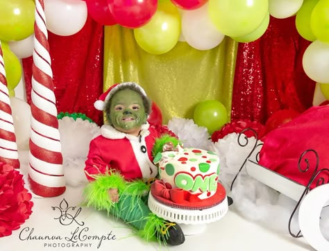 Grinch smash cake! Grinch Birthday Pictures, Grinch Birthday Smash Cake, Grinch Birthday Photoshoot, Grinch 1st Birthday Smash Cake, 1st Birthday Grinch Theme, Grinch One Year Old Party, Grinch Smash Cake Ideas, Grinch 1st Birthday Cake, Grinch First Birthday Party Boy