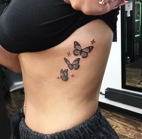 22 Elegant Butterfly Tattoo Design & Ideas For Men and Women Rib Tattoos For Women, Ribcage Tattoo, Pretty Hand Tattoos, Butterfly Tattoos For Women, Pretty Tattoos For Women, Dope Tattoos For Women, Small Hand Tattoos, Butterfly Tattoo Designs, Cute Tattoos For Women