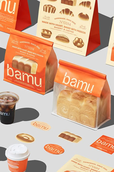 Behold Bamu Bakery's vibrant brand identity and packaging by Indego Macao. This design fuses traditional bakery charm with modern aesthetics, where every detail from color to typography evokes warmth and appeal. Note: Fivestar Branding Agency is a design and branding firm. This showcased work, credited to the original artist, is curated for inspiration. 🍞🧡 #BrandIdentity #PackagingDesign #BakeryBranding #DesignInspiration #FoodPackaging #Branding #BakeryPackaging #GraphicDesign #LogoDesign Aesthetic Bakery Packaging, House Packaging Design, Graphic Design Food Packaging, Bakery Brand Identity Design, Cool Food Packaging, New Packaging Design, Pastry Box Packaging Design, Bakery Branding Packaging, Bake Packaging