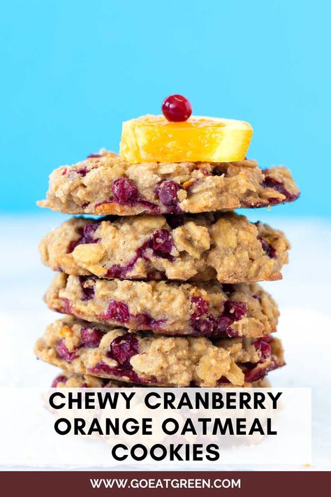 A stack of healthy chewy cranberry orange oatmeal cookies with sliced orange and cranberry on top. Healthy Gluten Free Baked Goods, Nut Free Christmas Baking, Oatmeal Orange Cranberry Cookies, Healthy Cookies Nut Free, Orange Cranberry Oatmeal Cookies, Cranberry Orange Oatmeal Cookies, Gluten Free Cranberry Orange Cookies, Healthy Cranberry Cookies, Vegan Cranberry Cookies