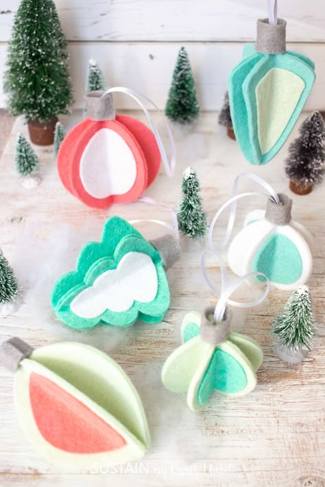 Retro-Inspired DIY Felt 3D Christmas Ornaments Winter Projects For Kids, Christmas Decor Mid Century, 3d Christmas Ornaments, Christmas Craft Decor, Christmas Crafts And Activities, Whimsical Crafts, Retro Christmas Decor, Felt Christmas Tree Decorations, Diy Felt Christmas Ornaments