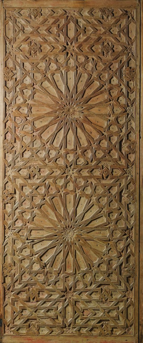 A RARE CARVED WOOD DOOR PANEL, SPAIN OR MOROCCO, LATE 15TH- 16TH CENTURY of rectangular form, comprising of pinewood sections decorated with an intricate geometric pattern composed of two large sixteen-pointed stars, interstices filled with smaller stars and polygons, reverse side decorated with one half of a monumental shamsa with geometric rays radiating further smaller half shamsas, with further interlocking polygons and stars, traces of colour pigment, mounted on iron display stand Carved Wood Door, Islamic Patterns, Wood Designs, Carved Doors, Islamic Design, Design Wood, Moroccan Design, Islamic World, Wood Door