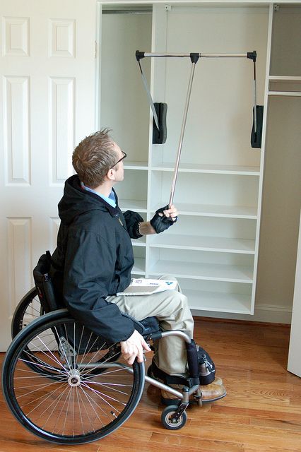 Adjustable closet rod. This would be great. Normal closet rods are too high for me but the lowered ones tend to let clothes drag. If it could be high but let me pull it down when needed, that would be perfect. Accessible Closet, Accessible Bedroom, Wheelchair House, Coin Banquette, Accessibility Design, Accessible House, Accessible Kitchen, Accessible Design, Adaptive Equipment